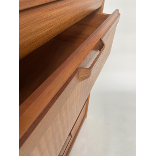 331 - CHEST, 1970s Afromosia teak, with 'blind' frieze drawer above four long deep drawers, and bentwood d... 