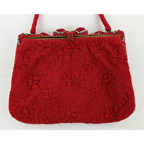 9 - EVENING BAGS, collection of three, comprising one in red, one in black with enameled decoration, the... 