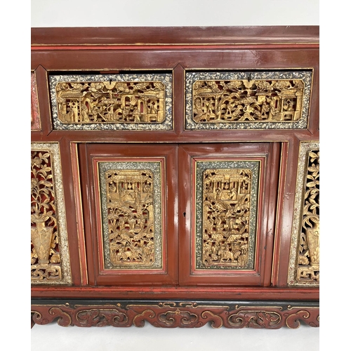 232 - CHINESE CABINET, 19th century Chinese scarlet lacquered and carved giltwood inset panels with two dr... 