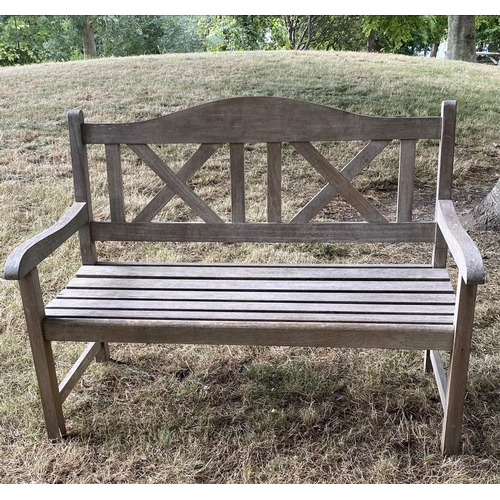 235 - GARDEN BENCH, silvery weathered teak with double 'X' back, 119cm W.