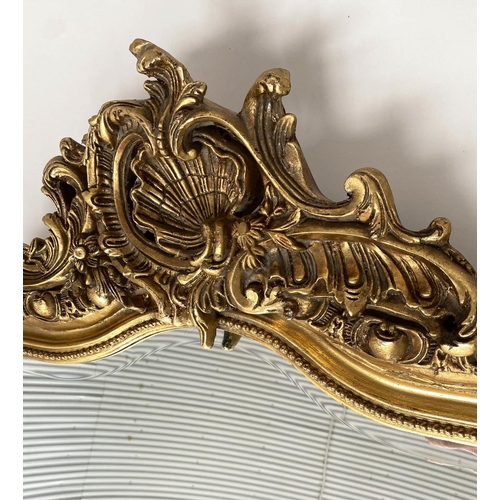 195 - OVERMANTEL MIRROR, French giltwood with bevelled plate, arched 'C' scroll and shell side crest and b... 