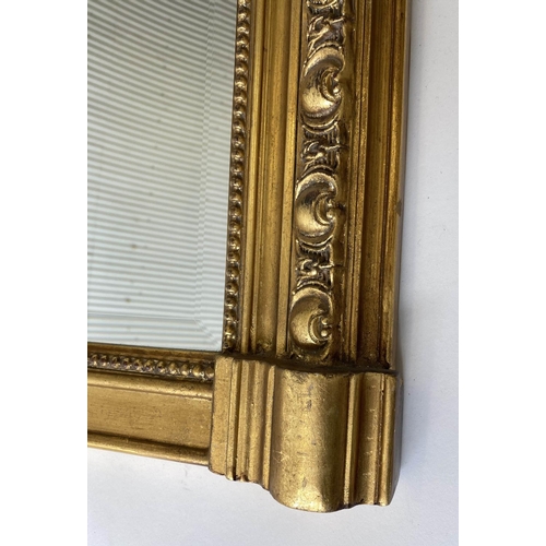 195 - OVERMANTEL MIRROR, French giltwood with bevelled plate, arched 'C' scroll and shell side crest and b... 