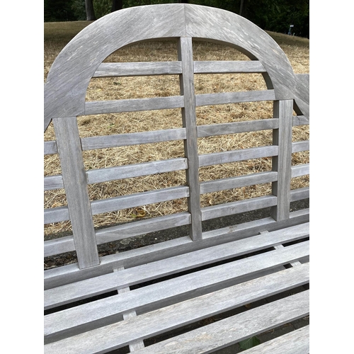 197 - GARDEN BENCH, weathered slatted teak, after a design by Sir Edwin Lutyens, 166cm W.