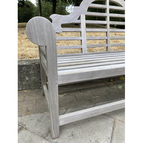 197 - GARDEN BENCH, weathered slatted teak, after a design by Sir Edwin Lutyens, 166cm W.