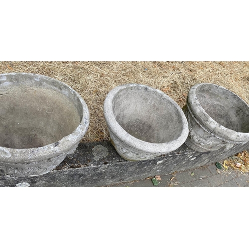 198 - GARDEN PLANTERS, a set of three, well weathered reconstituted stone, each with swag detail, 50cm x 3... 