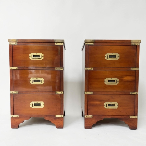 200 - CAMPAIGN STYLE BEDSIDE CHESTS, a pair, yewwood and brass bound each with three drawers, 35cm x 35cm ... 