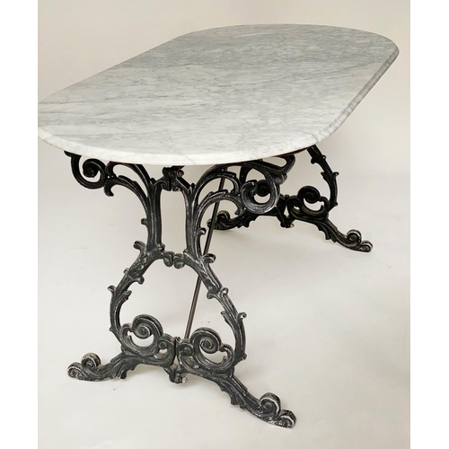 185 - CENTRE TABLE, variegated and veined white marble top with rounded ends, raised upon cast aluminum sc... 