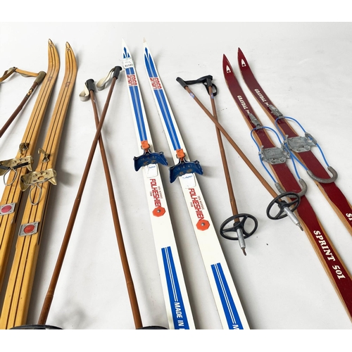 187 - SKIS, a set of three pairs, 1960s Norwegian cross country traditional plywood construction, each wit... 