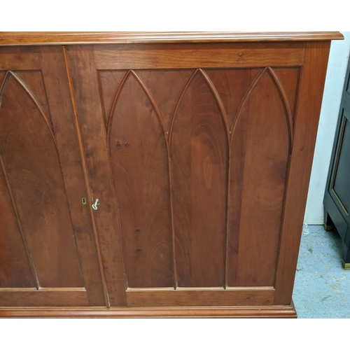 498 - BOOKCASE, cherrywood, gothic astrical detail, 244cm H x 117cm W x 53cm D.