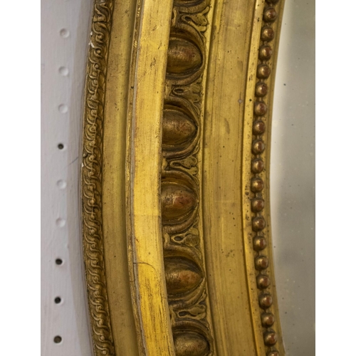 154 - WALL MIRROR, circa 1880, French giltwood and gesso with old oval bevelled plate and cartouche surmou... 