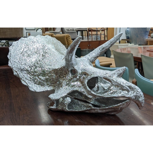 377 - FAUX TRICERATOPS SKULL, resin, silvered finish, 34cm x 60cm x 45cm.