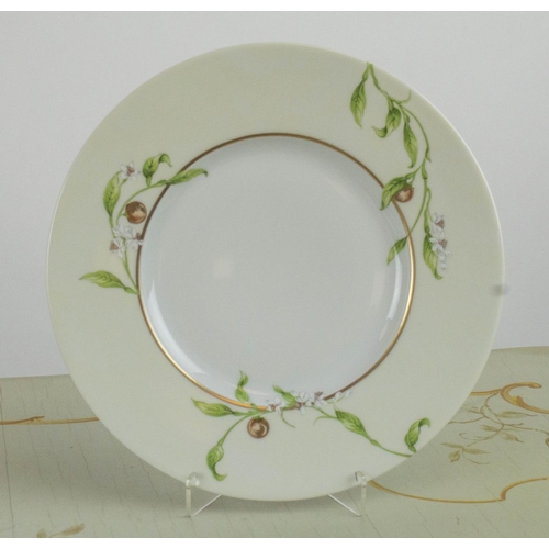 465 - PHILIPPE DESHOULIERES DESIGN LIMOGES PLATES, a set of ten, 24cm D. (10)