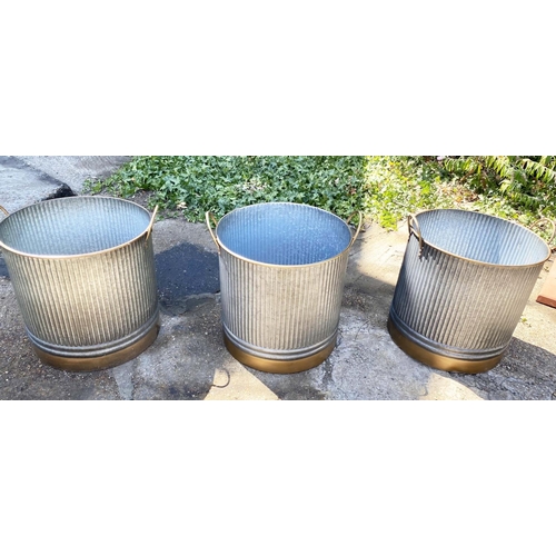 469 - GARDEN PLANTERS, a set of three, ribbed zinc design with gilt accents, 52cm x 52cm. (2)