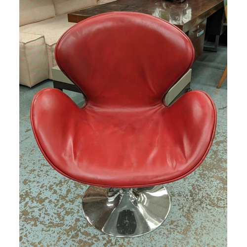 486 - SWAN STYLE SWIVEL CHAIR, Aviator style with distressed red leather upholstery, 68cm W x 91cm H.