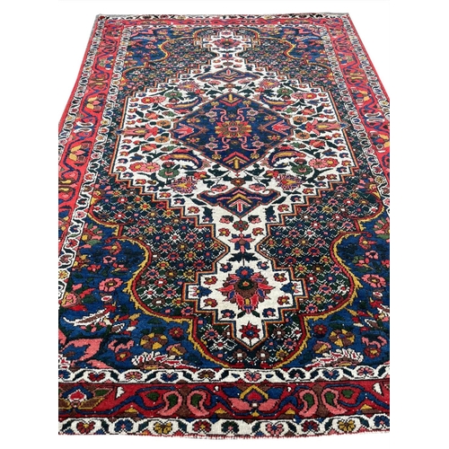 90 - ANTIQUE BAKTIARI RUG, 210cm x 137cm.