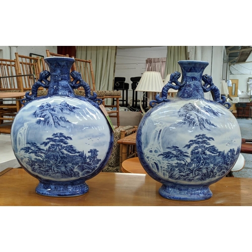 315 - MOON FLASKS, a pair, Chinese export style, blue and white ceramic, 59cm H. (2)