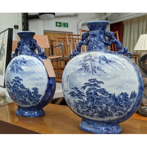 315 - MOON FLASKS, a pair, Chinese export style, blue and white ceramic, 59cm H. (2)