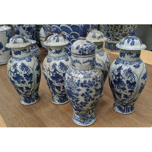 320 - VASES WITH COVERS, a set of four Chinese export style, blue and white ceramic and another of differi... 