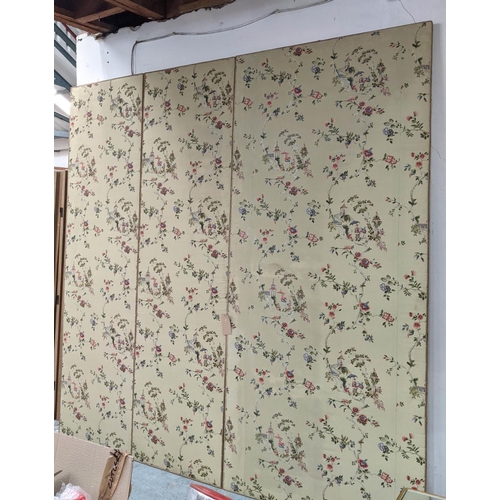 321 - WALL PANELS, a set of three upholstered in a Chinese pattern, 275cm x 122cm at largest. (3)