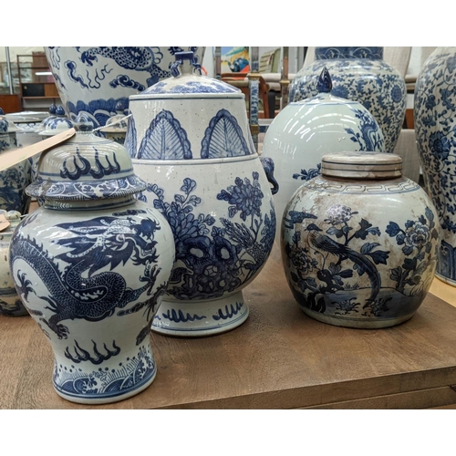 325 - VESSELS WITH COVERS, a set of four, various, Chinese export style, blue and white ceramic, 39cm H at... 