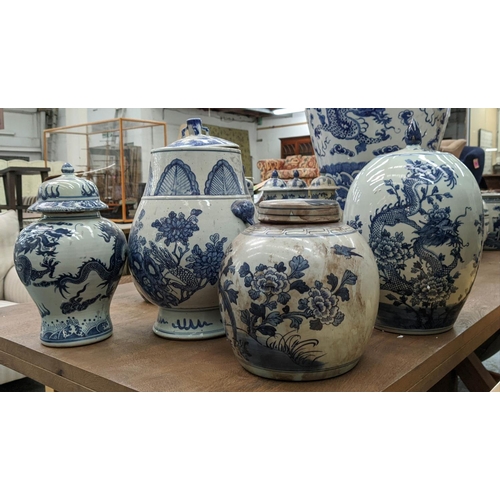 325 - VESSELS WITH COVERS, a set of four, various, Chinese export style, blue and white ceramic, 39cm H at... 