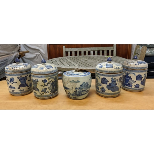 326 - JARS WITH COVERS, a set of four, Chinese export style, blue and white ceramic, and one other, 18cm a... 