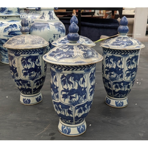 327 - JARS WITH COVERS, a set of four, Chinese export style, blue and white ceramic, 32cm H. (4)