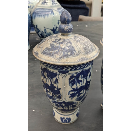 327 - JARS WITH COVERS, a set of four, Chinese export style, blue and white ceramic, 32cm H. (4)