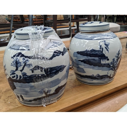 329 - GINGER JARS, a pair, Chinese export style, blue and white ceramic, 26cm H. (2)