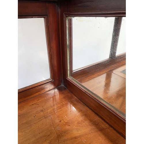 303 - LOBBY WRITING TABLE, Edwardian mahogany, with glazed and mirror panelled gallery, adjustable leather... 