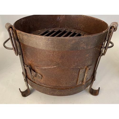 510 - SMALL FIRE PITS, each of two handled form, raised on three feet, 22cm x 36cm x 25cm. (3)