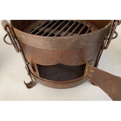 510 - SMALL FIRE PITS, each of two handled form, raised on three feet, 22cm x 36cm x 25cm. (3)