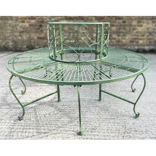 470 - ARCHITECTURAL GARDEN TREE BENCH, antiqued green painted finish 77cm x 140cm x 140cm.