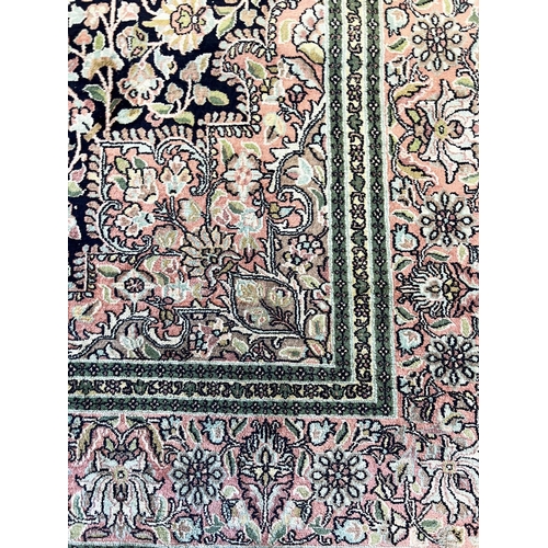 106 - KASHMIR SILK CARPET, 275cm x 175cm.