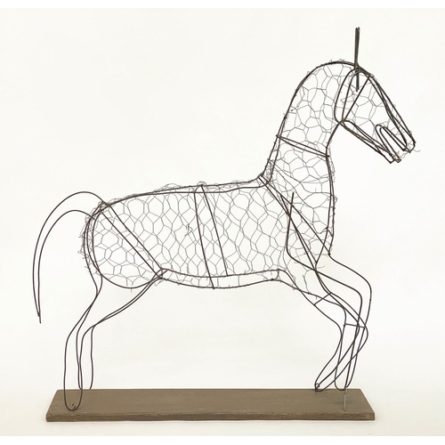 122 - WIREWORK HORSE, galvanised wire work in the form of a foal on stand, 11cm H x 93cm W x 22cm D.