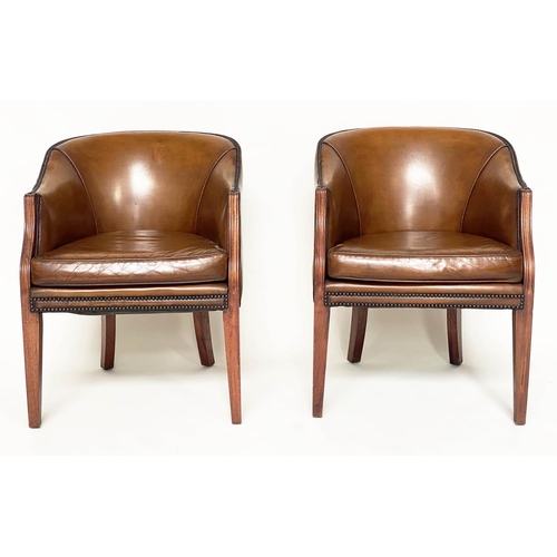 126 - LIBRARY/DESK ARMCHAIRS, a pair, early 20th century mahogany each with studded tan leather upholstery... 