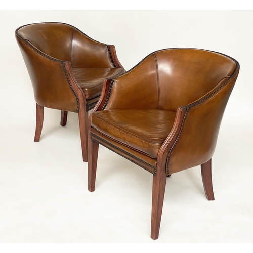 126 - LIBRARY/DESK ARMCHAIRS, a pair, early 20th century mahogany each with studded tan leather upholstery... 