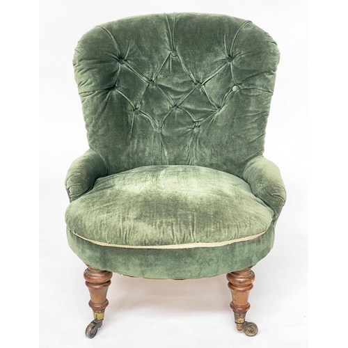 130 - SLIPPER ARMCHAIR, Victorian walnut with buttoned Royal green velvet upholstery and turned front supp... 