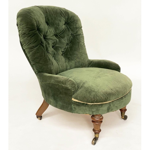 130 - SLIPPER ARMCHAIR, Victorian walnut with buttoned Royal green velvet upholstery and turned front supp... 