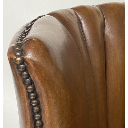 132 - BARREL-BACK ARMCHAIR, mid brown brass-studded tan hide leather upholstered with bowed ribbed back by... 