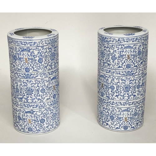 136 - CHINESE POTS, a pair, early 20th century blue and white ceramic of cylindrical lipped form and filig... 