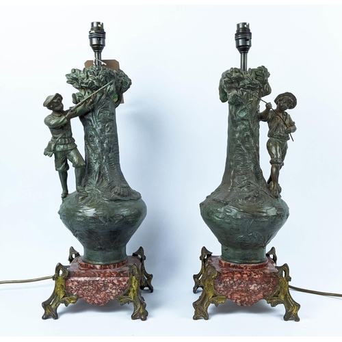 30 - FIGURAL TABLE LAMPS, early to mid 20th century spelter, raised on red marble bases with gilt metal f... 