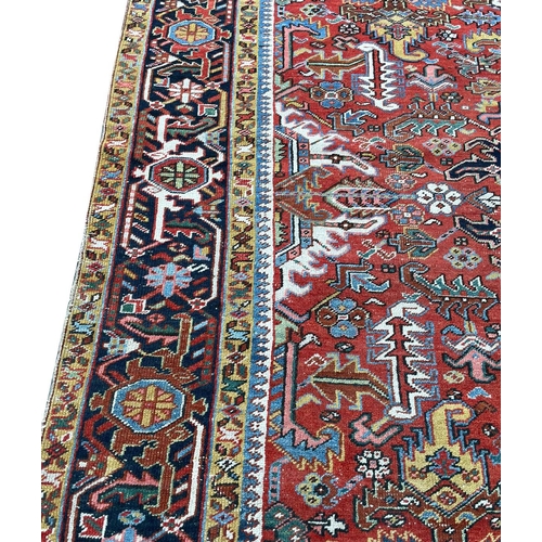 90 - ANTIQUE PERSIAN HERIZ CARPET, 295cm x 218cm.