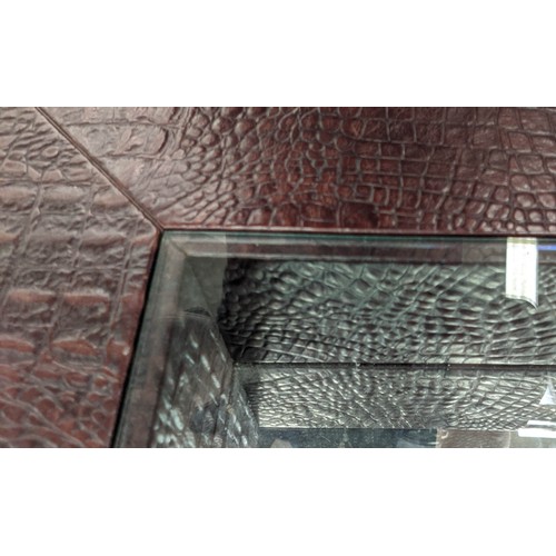 408 - COFFEE TABLE, 140cm x 80cm x 40cm, faux crocodile upholstered, mirrored interior covered by glass to... 