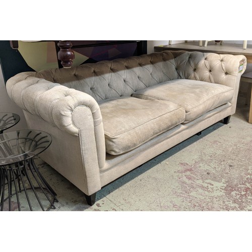 410 - CHESTERFIELD STYLE SOFA, 220cm W, with two floral scatter cushions.