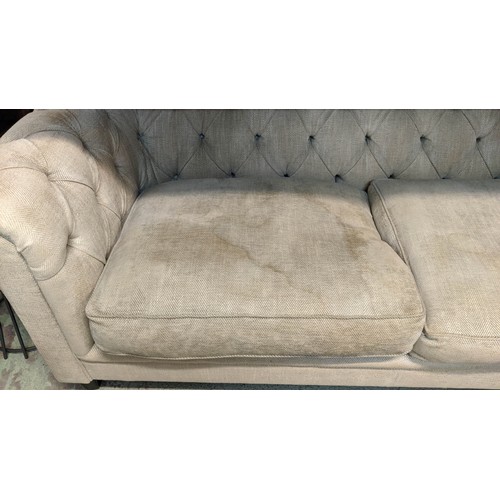 410 - CHESTERFIELD STYLE SOFA, 220cm W, with two floral scatter cushions.