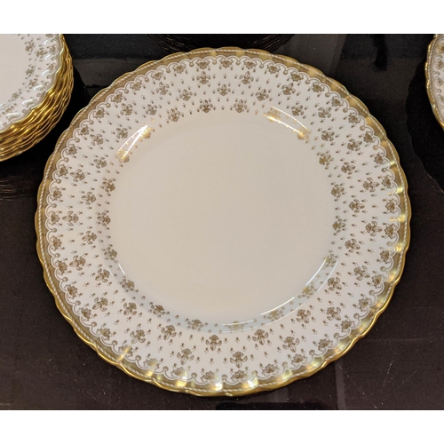 28 - SPODE 'FLEUR DE LYS-GOLD' DINNER SERVICE, comprising eight cups, eight saucers, eight side plates, e... 