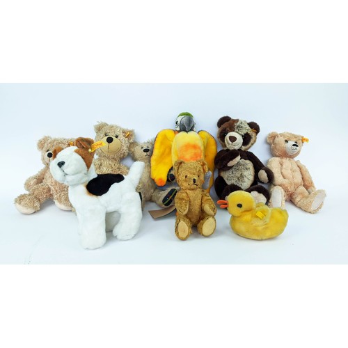 26 - STEIFF TEDDY BEARS, a collection of seven Steiff teddies including, three teddies, a panda, a parrot... 