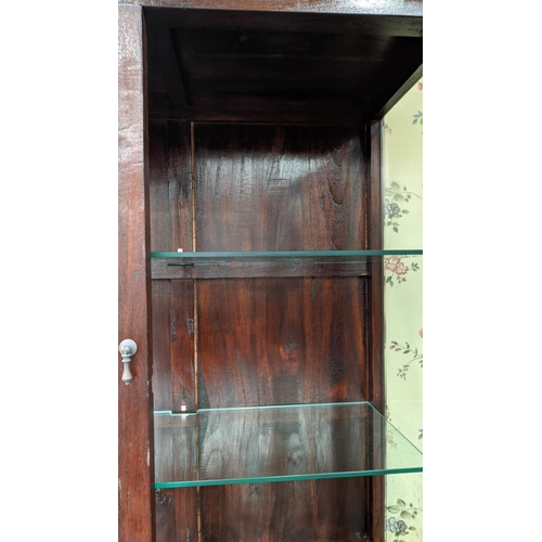 334 - GLAZED BOOKCASE, 103cm W x 45cm D x 204cm H, with glass section on a cupboard base.