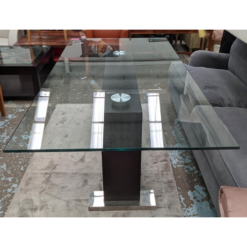 353 - DINING TABLE, 200cm x 100cm x 74cm, contemporary glass topped design, on stepped central support.